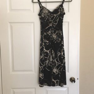 Black dress with floral design.